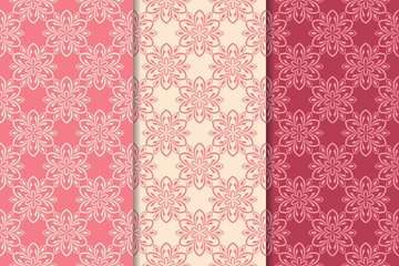 Set of red floral ornaments. Cherry pink vertical seamless patterns
