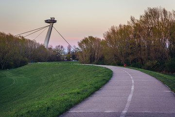 So called UFO Bridge seen from cycle path on a embankment of Danube River in Bratislava, Slovakia