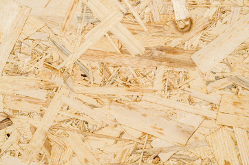 Fototapeta na wymiar surface texture of oriented strand board (OSB), Wood board made from piece of wood