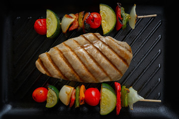 grilled chicken breast with brochette vegetable