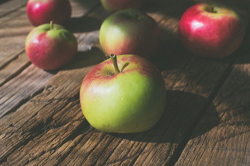 Apples on a wooden background.