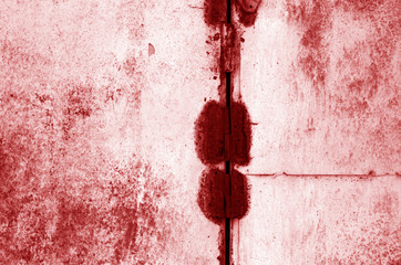 Grungy rusted metal surface in red tone.