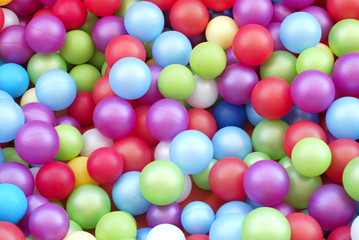 A lot of plastic colored balls - background.