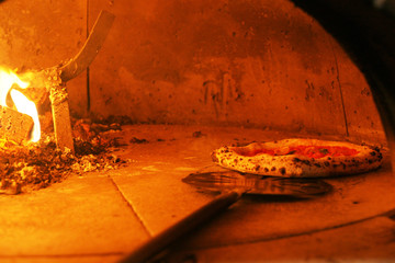Neapolitan pizza in a wood stove