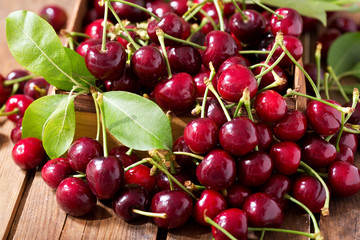 fresh cherries on wooden table