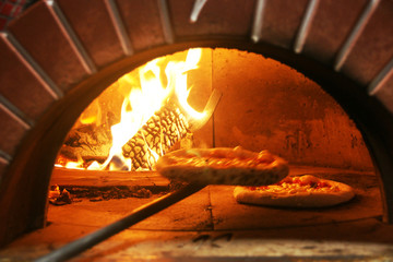 Neapolitan pizza in a wood stove