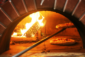 Neapolitan pizza in a wood stove