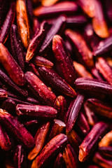 Pile of raw wild rice, black and ready to cook a healthy diet meal