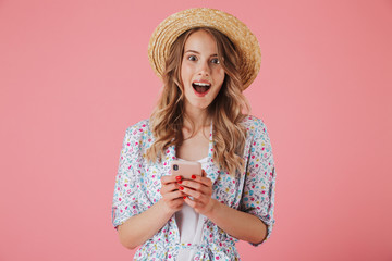 Portrait of an excited young woman in summer dress