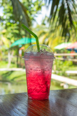Red soda cold thirst in garden.