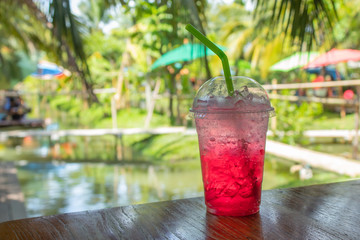 Red soda cold thirst in garden.