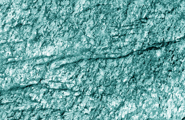 Old stone texture in cyan tone.