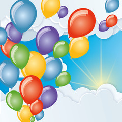 balloons fly in the sky among the clouds