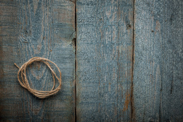 Hank of twine on wooden background