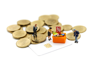 Miniature people : Shoppers with discount for shopping items and coins,Business Shopping concept.