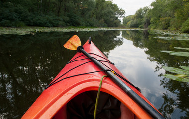 kayak with a paddle on the river