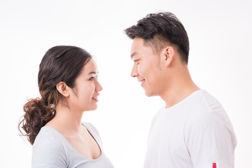 Smiling Young Couple Looking At Each Other
