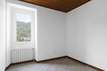 Fototapeta premium White and completely empty room with wood on the ceiling