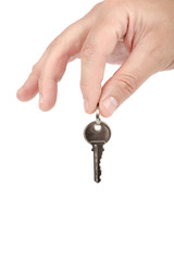Keys from the lock in hand on white background.