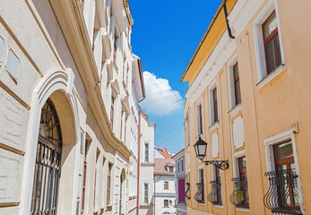 A view of a narrow street in the old city center in Europe