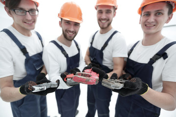 image of a group of builders with gas keys