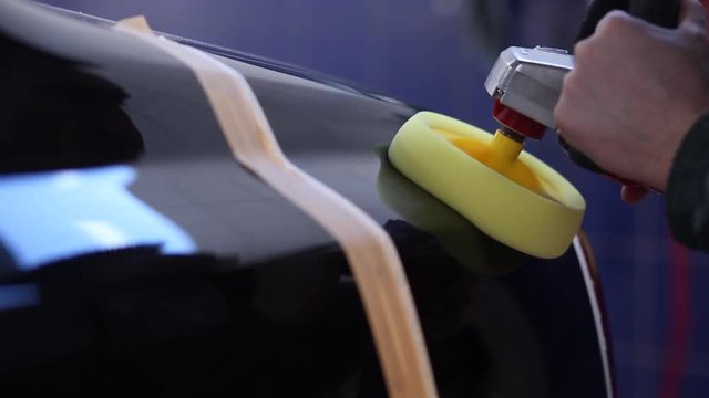 Car polishing process. Close up.