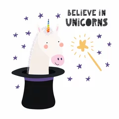 Zelfklevend Fotobehang Hand drawn vector illustration of a cute funny unicorn appearing from a magician top hat, with quote Believe in unicorns. Isolated objects. Scandinavian style flat design. Concept for children print. © Maria Skrigan
