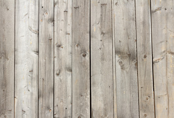 wooden background, wooden wall of thin boards with nails and slits