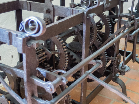 Old machine with various gears in castle of buchlov