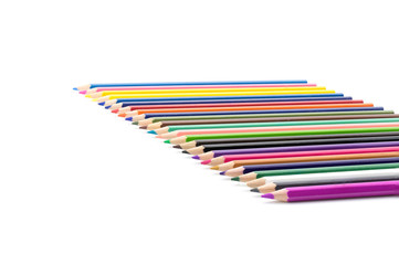Colored pencils on white background