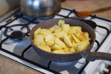 Pan-fried potatoes in a pan