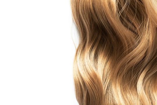 long blond wavy hair isolated on white background