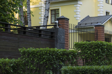 Street surveillance camera on the fence.