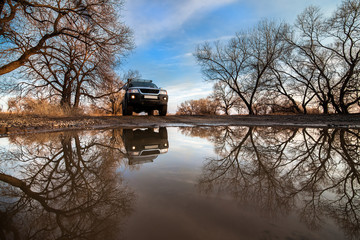 Japanese SUV at a big puddle