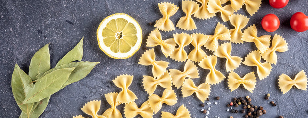Food background Uncooked Pasta Macaroni Farfalle