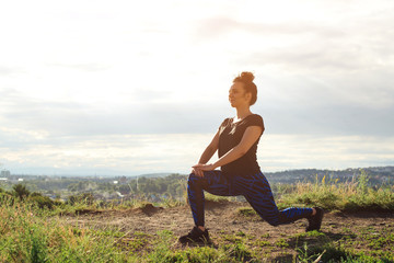 woman doing sport outdoor in evening time