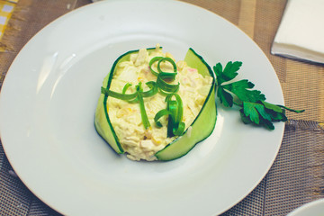 process of preparation of salad by the child at school of young cooks