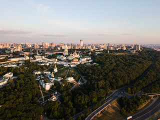 Aerial top view of Kiev Pechersk Lavra churches on hills from above, cityscape of Kyiv city