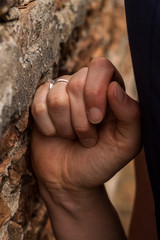wedding ring on a medieval wall - 207932443