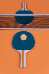 Table tennis or ping pong rackets and balls.