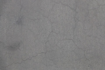 Naklejka premium Gray concrete wall texture. Cement floor background with fine grain and scratches