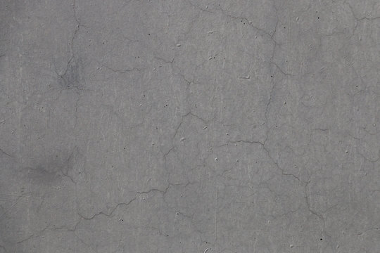 Gray concrete wall texture. Cement floor background with fine grain and scratches
