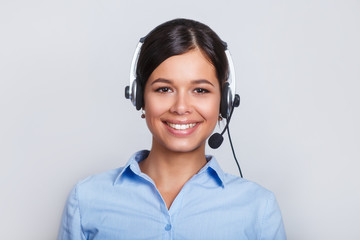customer support phone operator in headset, with blank copyspace area for slogan or text message,...
