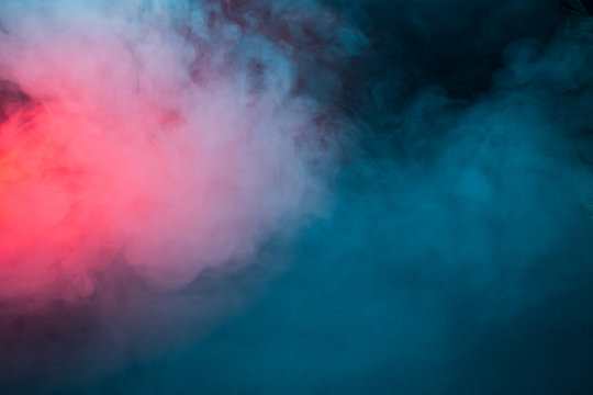 Colorful smoke on a black background closeup
