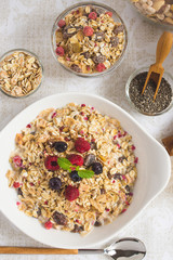 Freshly Prepared Muesli With Milk, Chia Seeds, Berries and Cinnamon. Bright Sunny Morning with Healthy Breakfast.