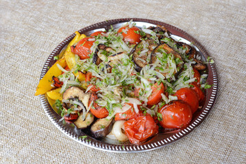 grilled vegetables on a silver plate
