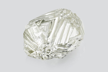 Transparent rough diamond isolated on white background