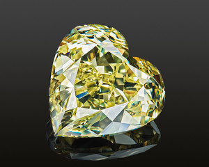 Luxury yellow transparent sparkling gemstone  shape heart cut diamond  isolated on black background