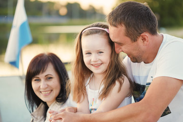 Obraz premium family portrait with a smile on the nature.