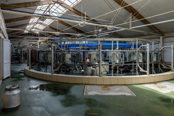 Automatic milking system equipment in the milking parlour.